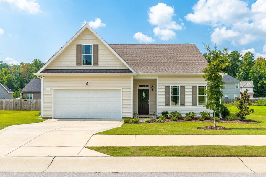 Representative exterior photo of a completed home built from the Hogan by RiverWILD Homes in Maggie Way, Wendell, NC (Image 26). Representative exterior photo of a completed home built from the Hogan by RiverWILD Homes in Maggie Way, Wendell, NC (Image 26).