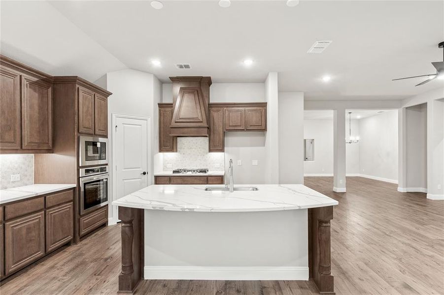Furnished interior view inside a new home in Stone River Glen 60s, Royse City (Image 11).