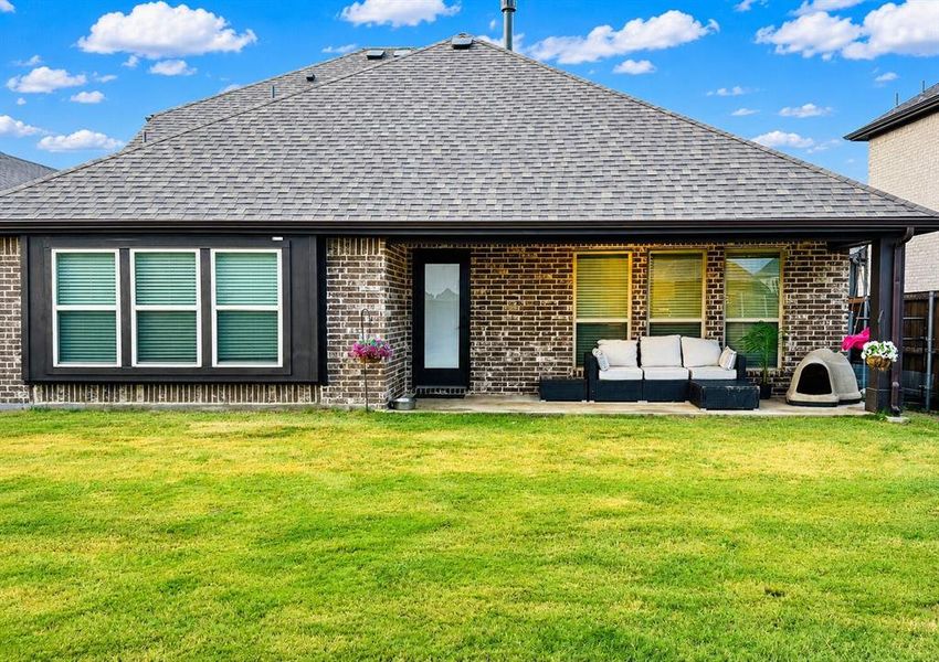 Exterior details and patio area of a home in Silo Mills, Joshua (Image 3).