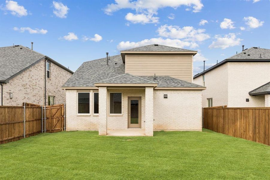 Exterior details and patio area of a home in AnaCapri, Anna (Image 3).