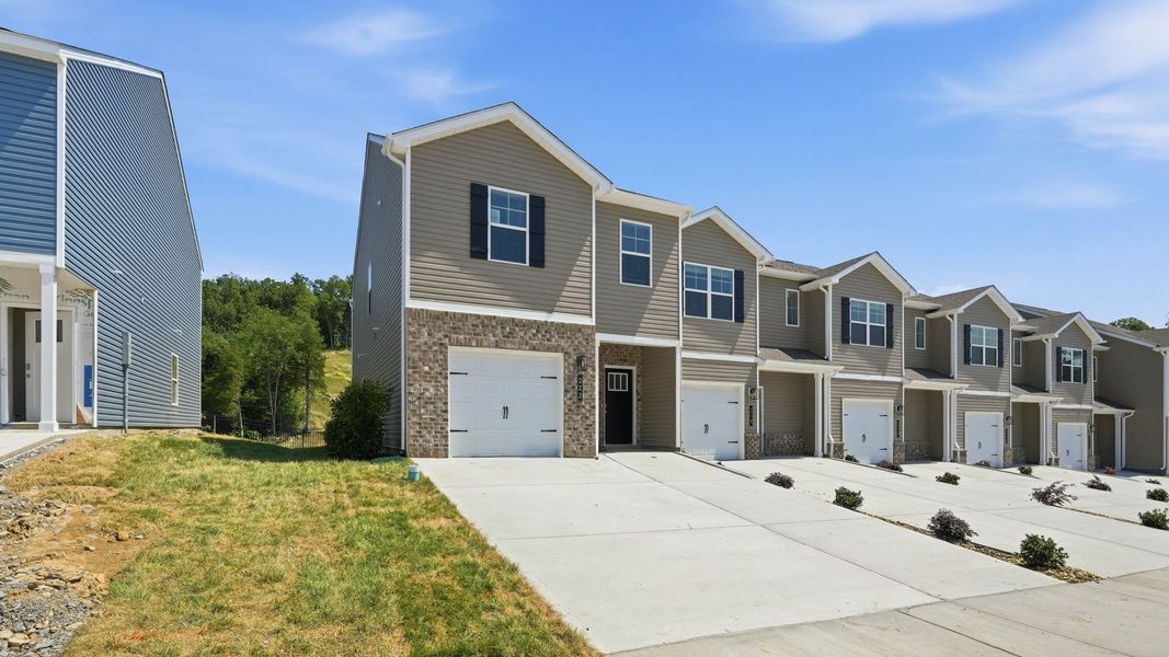 Front exterior of a new home in Cherokee Crossing, Kodak, TN, highlighting curb appeal (Image 2).