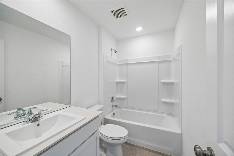 secondary full bath located on the second floor between bedrooms