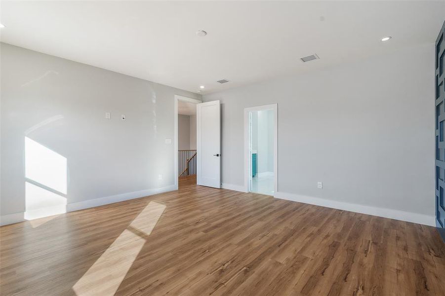 Empty room featuring light hardwood / wood-style floors