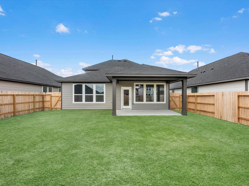 Exterior details and patio area of a home in Mason Woods, Cypress (Image 3).