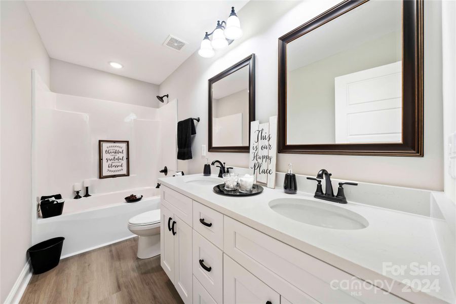 Wow! Main Bath has double vanities.