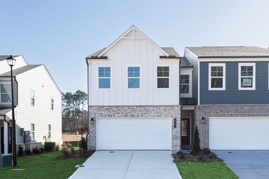 Front exterior of a new home in Darlington, Loganville, GA, highlighting curb appeal (Image 25).
