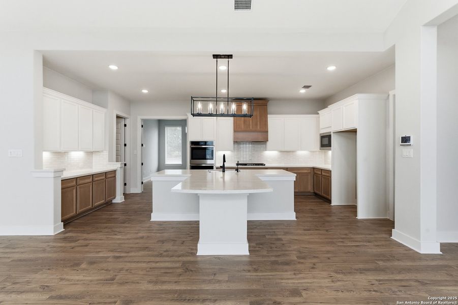 Furnished interior view inside a new home in Potranco Oaks, Castroville (Image 17).