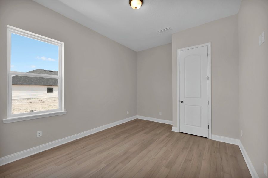 Representative unfurnished interior of a home built from the Stella by Riverside Homes in Hidden Creek at SilverLeaf, St. Augustine (Image 53).