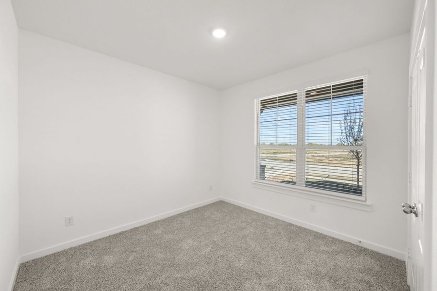 Representative unfurnished interior of a home built from the Ironwood II Hunters Crossing 65s by Brohn Homes in Hunters Crossing, Sealy (Image 16).