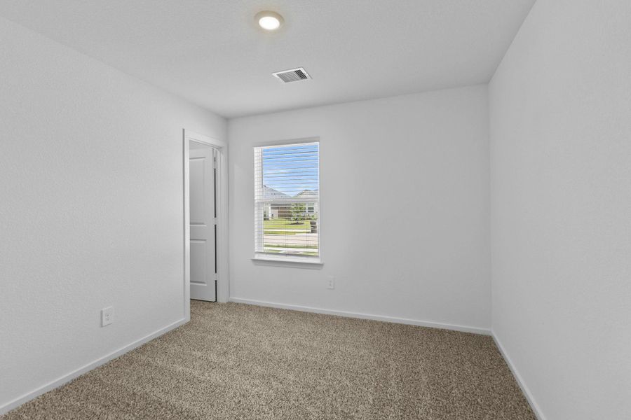 Spacious, unfurnished interior of a new home in The Canopies, Splendora (Image 20).