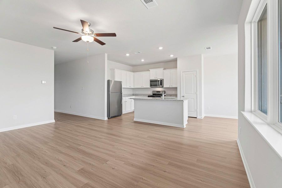 Spacious, unfurnished interior of a new home in Vacek Country Meadows, Richmond (Image 2).
