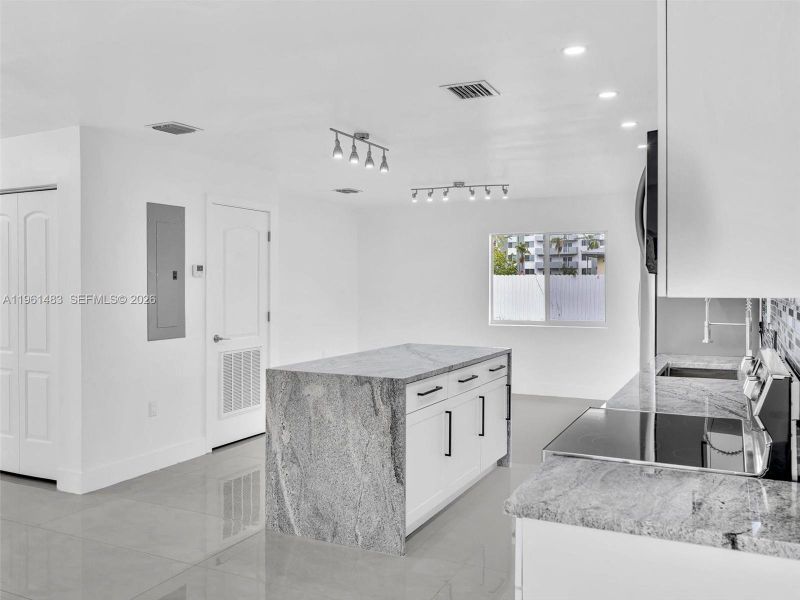 Furnished interior view inside a new home in , North Miami (Image 11).