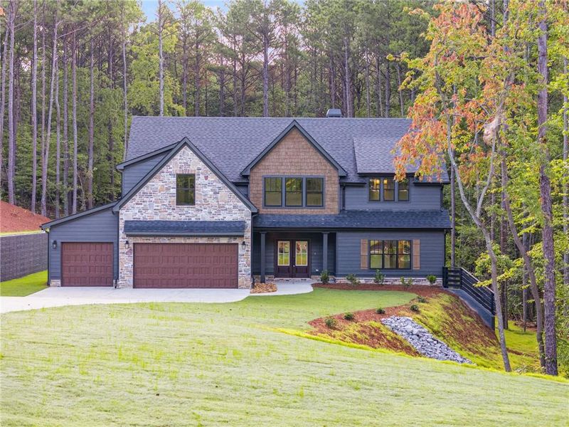 Front exterior of a new home in Liberty Station, Bremen, GA, highlighting curb appeal (Image 28).