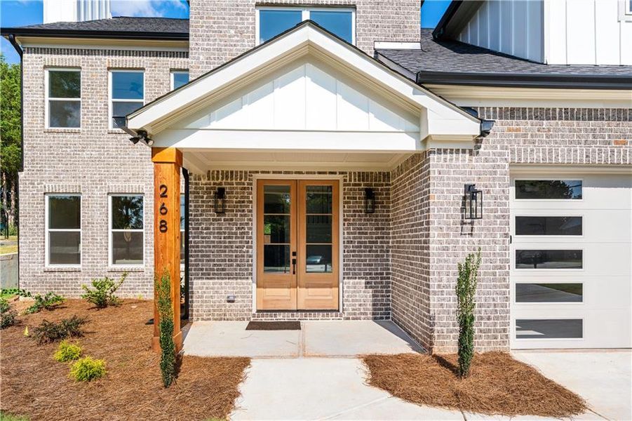 Front exterior of a new home in , Lawrenceville, GA, highlighting curb appeal (Image 23). Front exterior of a new home in , Lawrenceville, GA, highlighting curb appeal (Image 23).