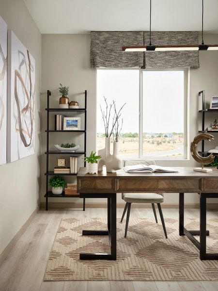Representative furnished interior of a home built from the 4036 by Tri Pointe Homes in Reunion, Commerce City (Image 10).