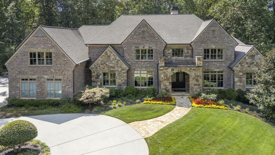 Front exterior of a new home in , Johns Creek, GA, highlighting curb appeal (Image 9).