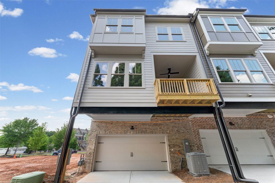 Exterior details and patio area of a home in Overlook at Gin Property, Senoia (Image 13).