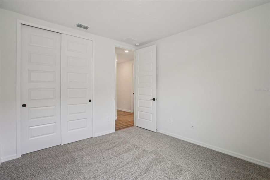 Spacious, unfurnished interior of a new home in Two Rivers - Signature Series, Zephyrhills (Image 28).