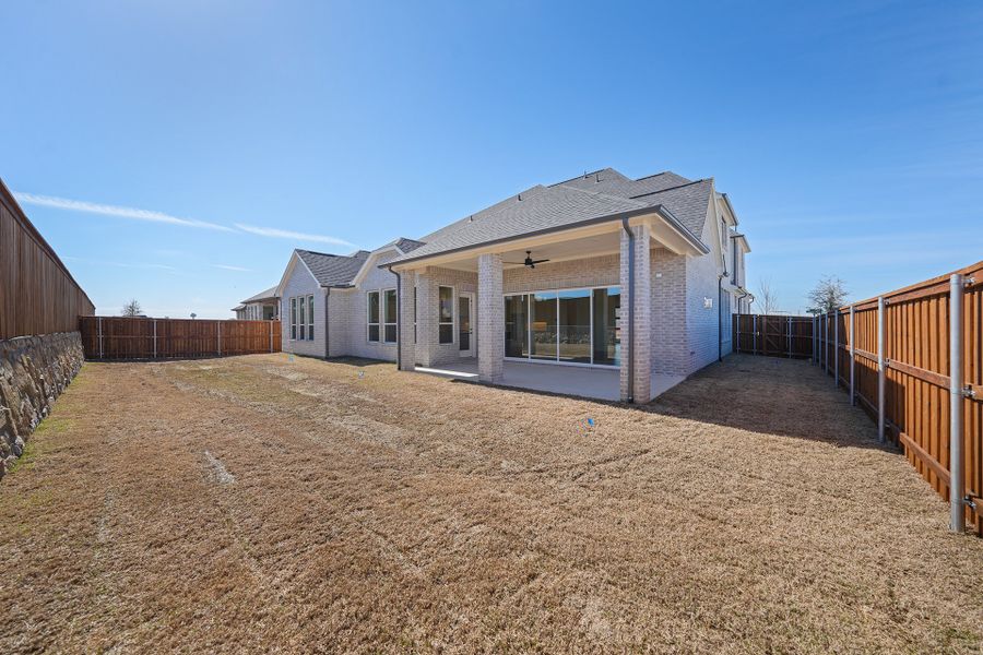 Exterior details and patio area of a home in Park Place - 80' Lots, Prosper (Image 4).