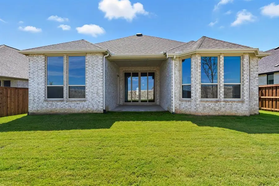 Exterior details and patio area of a home in Trinity Falls, McKinney (Image 1). Exterior details and patio area of a home in Trinity Falls, McKinney (Image 1).