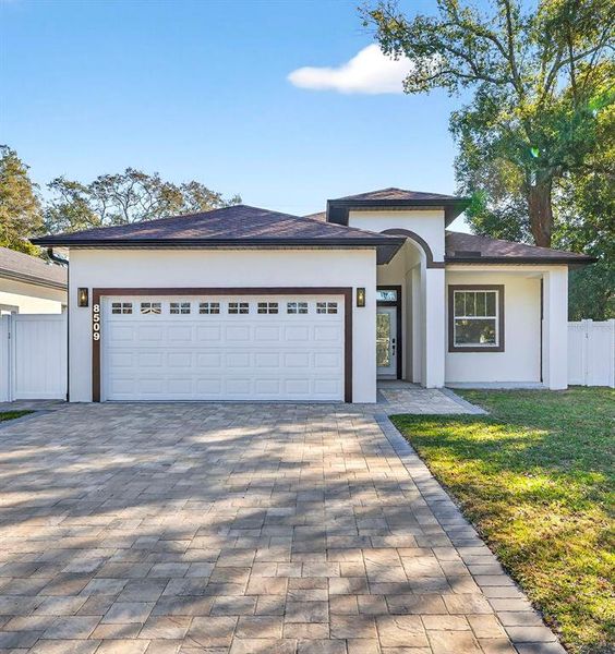 Front exterior of a new home in , Tampa, FL, highlighting curb appeal (Image 22). Front exterior of a new home in , Tampa, FL, highlighting curb appeal (Image 22).