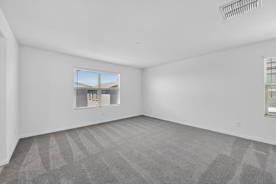 Spacious, unfurnished interior of a new home in Artisan at Asante, Surprise (Image 16).