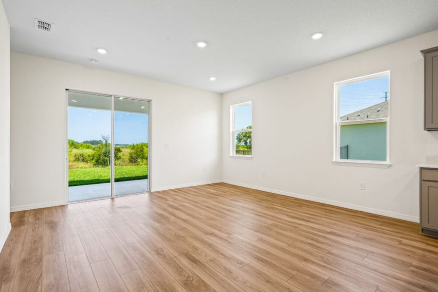 Representative unfurnished interior of a home built from the Jensen by Holiday Builders in Pineapple Grove, Port St. Lucie (Image 9).