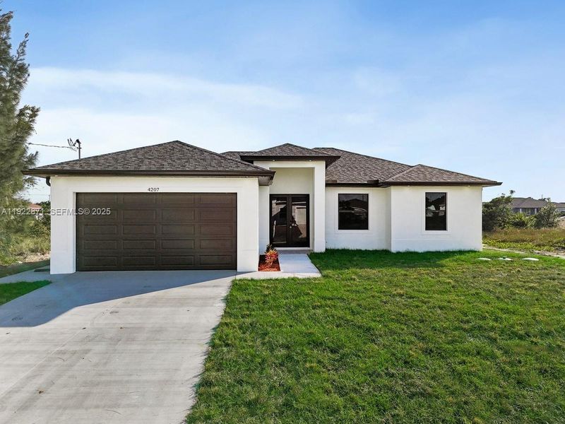 Front exterior of a new home in , Lehigh Acres, FL, highlighting curb appeal (Image 1).