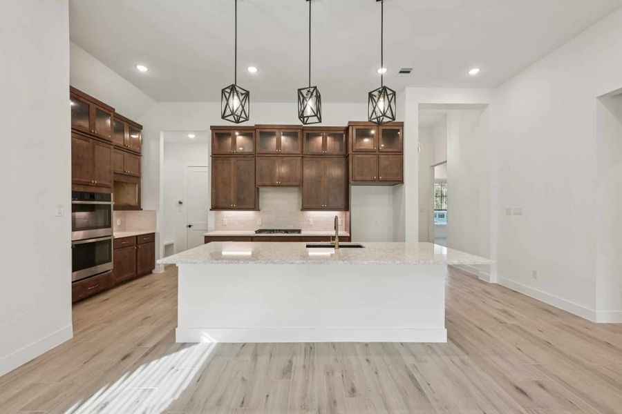 Representative furnished interior of a home built from the Summerton – 50′ Lot by Chesmar Homes in Lakes of Cane Island, Katy (Image 5).