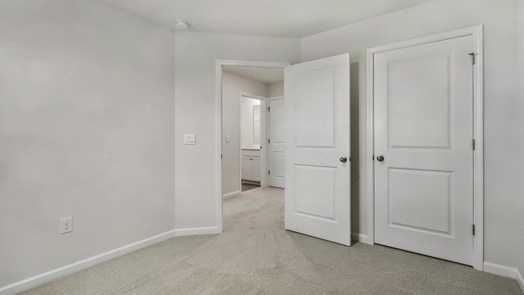 Spacious, unfurnished interior of a new home in The Townes at Honeycutt Oaks, Angier (Image 21).