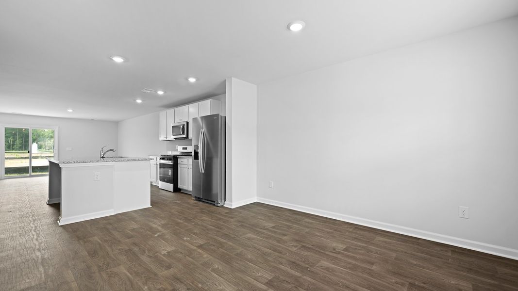 Spacious, unfurnished interior of a new home in Pine Hills Townhomes at Cane Bay, Summerville (Image 16).