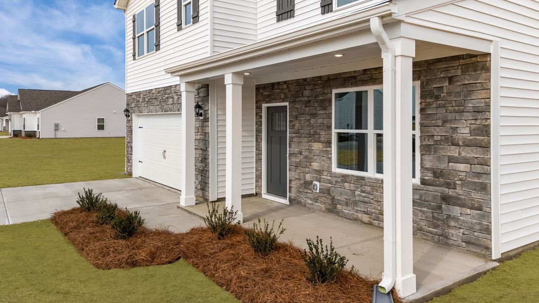 Exterior details and patio area of a home in Dail Farm, Charlotte (Image 4).