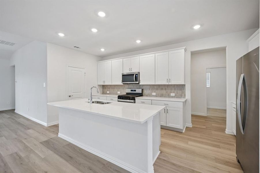 Photo is not of the actual home, but is an inspirational photo of builder’s model home and may depict options, furnishings, and/or decorator features that are not included.