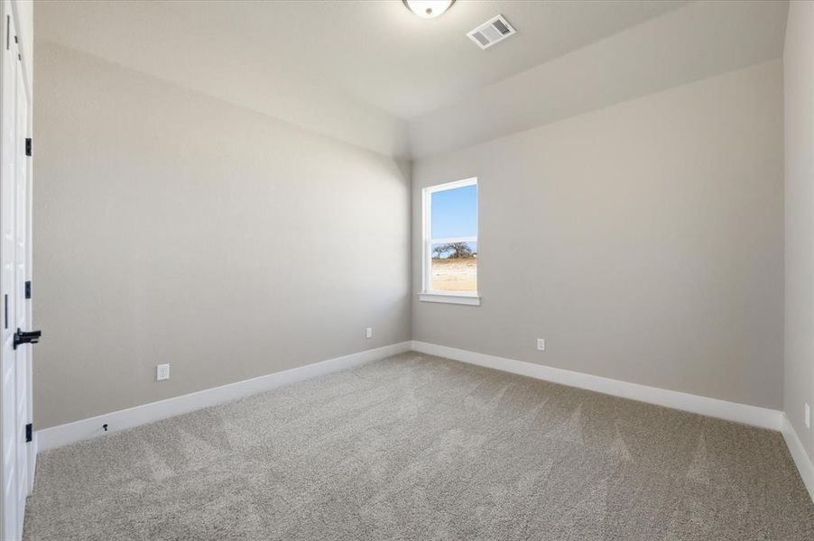 Spacious, unfurnished interior of a new home in Zion Valley, Springtown (Image 28).