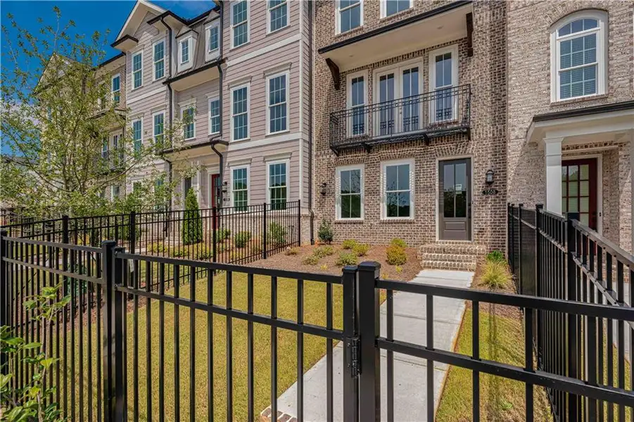 Exterior details and patio area of a home in Waterhaven, Cumming (Image 30).