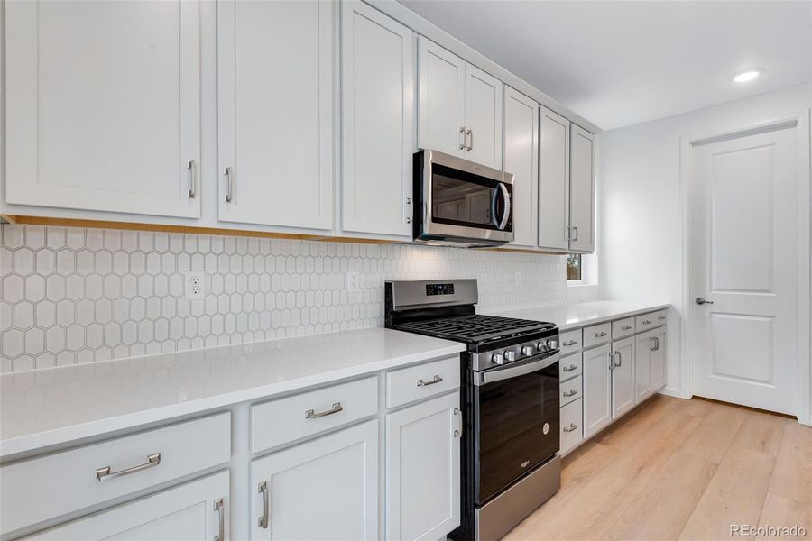 Furnished interior view inside a new home in Reunion, Commerce City (Image 10).