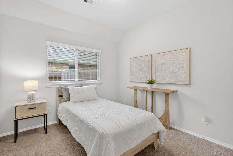 This is a secondary bedroom. This is one of four bedrooms. This is a secondary bedroom. This is one of four bedrooms.