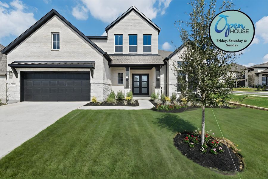 View of front of house with a front lawn, a garage, and concrete driveway View of front of house with a front lawn, a garage, and concrete driveway
