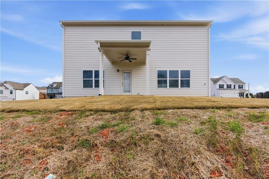 Exterior details and patio area of a home in The Reserve at Chapel Hill Phase II, Douglasville (Image 20).