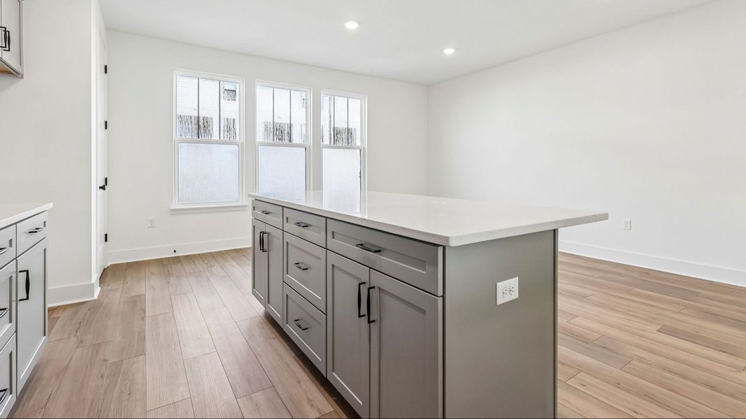 Furnished interior view inside a new home in Parkview at Hamlin, Winter Garden (Image 16).