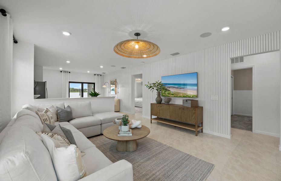 Spacious gathering room flowing into the kitchen a