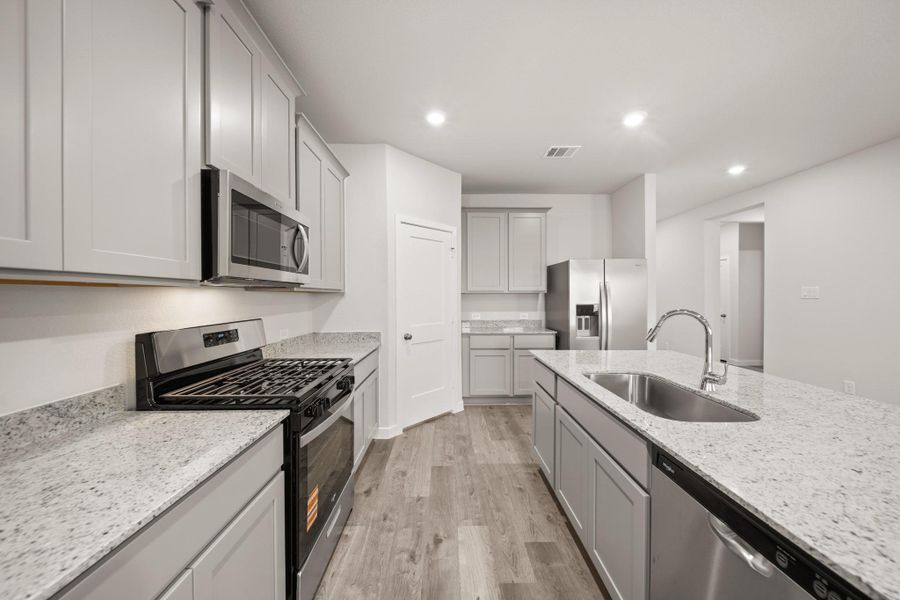 Furnished interior view inside a new home in Lexington Heights, Willis (Image 5).