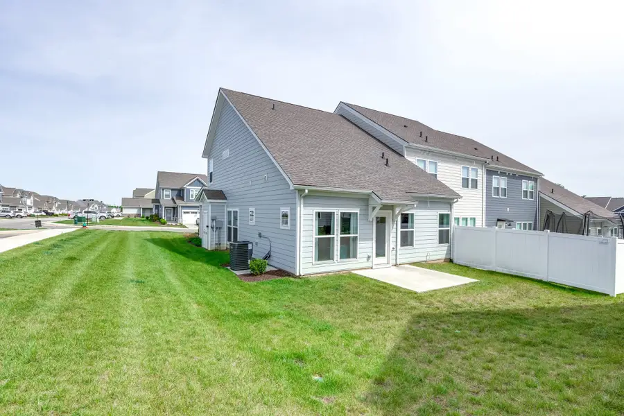 Exterior details and patio area of a home in Harvest Point, Spring Hill (Image 3).