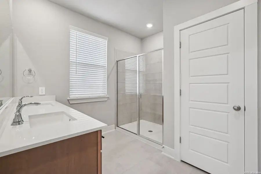 Furnished interior view inside a new home in Estancia Ranch - Premier Series, San Antonio (Image 15).