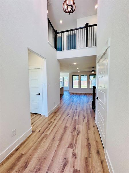 Welcome into your new dream home featuring high ceilings and open site lines throughout the beautiful home!