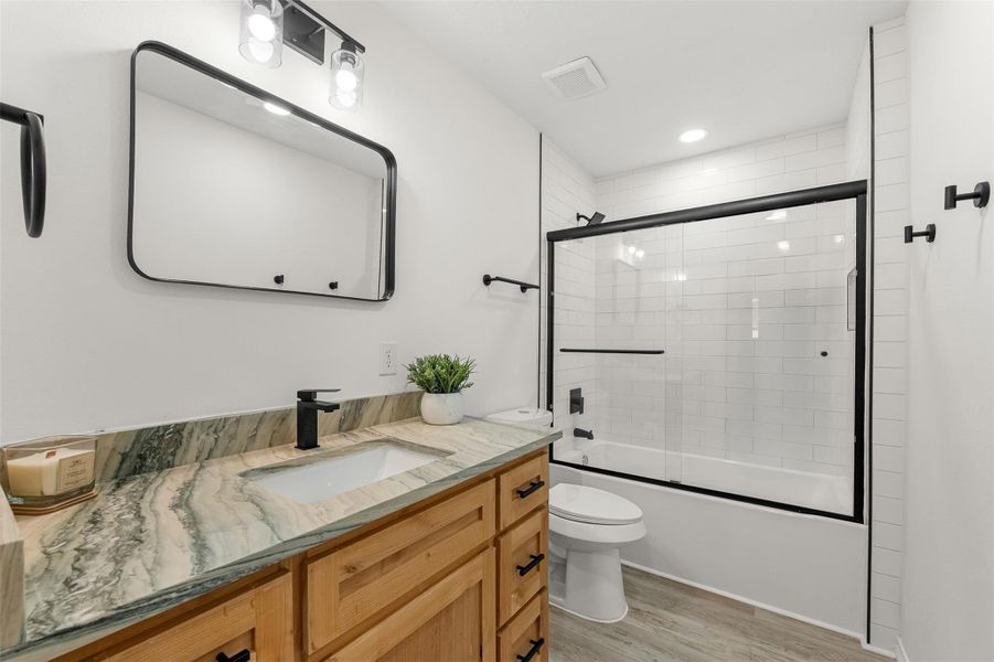 Furnished interior view inside a new home in , Point Blank (Image 15).