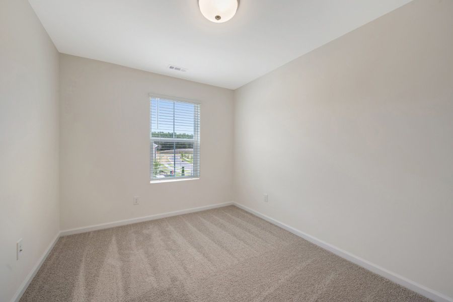 Spacious, unfurnished interior of a new home in Townes on Leesville, Durham (Image 22).