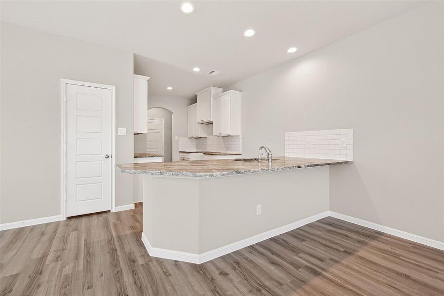 Furnished interior view inside a new home in Woodland Lakes, Houston (Image 8).