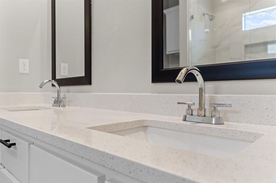Full bath with double vanity and a shower Full bath with double vanity and a shower