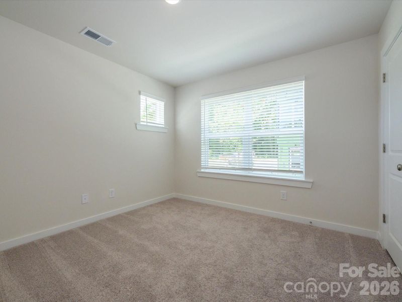 Spacious, unfurnished interior of a new home in Central Living at Craig, Charlotte (Image 23).